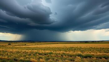 a stormy sky over wide open plains with rain in the distance. photo