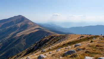 a windswept mountain ridge with bare stone. photo