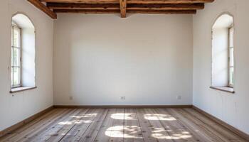 a room with rustic flooring and whitewashed walls. photo