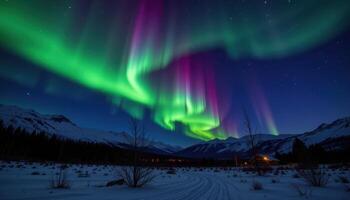 a night landscape with glowing aurora borealis. photo
