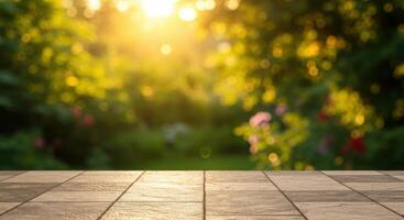 Sunlit tiled patio surface with blurred green garden background and warm bokeh lights photo