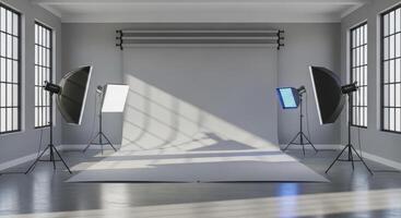 Empty professional photography studio with grey seamless backdrop and modern lighting equipment photo