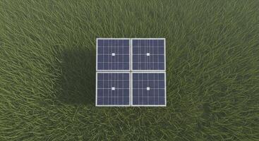 Overhead view of four solar panels on green grass, representing clean and renewable energy. photo