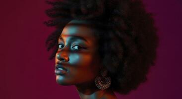 Striking studio portrait of a Black woman with afro and colorful light photo