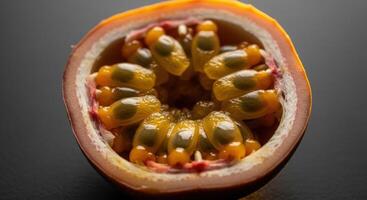 Close Up Macro Shot of Halved Passion Fruit with Vibrant Pulp and Seeds photo