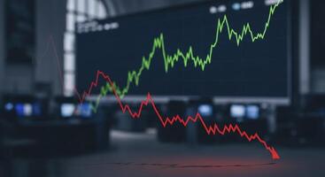 Financial market trends depicted with red decline and green growth line charts photo
