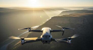 Grey Drone Flying Over a Vast Misty River Valley During Golden Hour photo