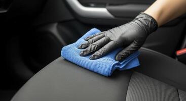 Car Interior Cleaning with Microfiber Cloth and Protective Glove photo