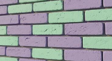 Pastel Green and Purple Brick Wall Texture with Alternating Color Pattern photo