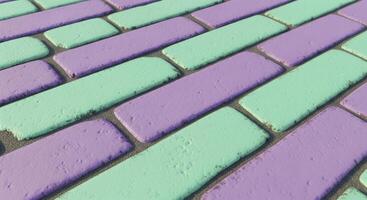 Pastel Purple and Mint Green Brick Wall with Alternating Color Pattern and Textured Surface photo