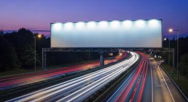 Blank Billboard Over Busy Highway with Light Trails at Twilight for Advertising photo