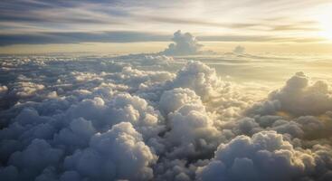Golden Sunlight Illuminates a Vast Expanse of Fluffy Cumulus Clouds From an Aerial Perspective photo