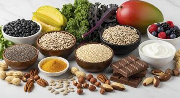 Variety of healthy superfoods and ingredients for a balanced diet and wholesome nutrition photo