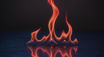 Vibrant Red and Orange Flames Reflecting on a Dark Surface with Intense Glow photo