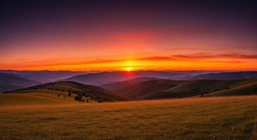 Dramatic sunset over rolling hills and a vast golden field in a serene landscape photo
