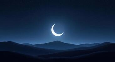Crescent Moon Shining Brightly Above Dark Rolling Hills in a Serene Night Sky photo
