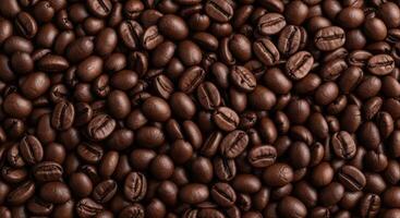 Tightly Packed Dark Roasted Coffee Beans Creating a Rich Textured Full Frame Pattern photo