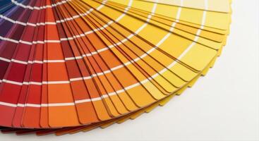 Fanned Out Color Swatch Book Displaying a Spectrum of Vibrant Hues for Design photo