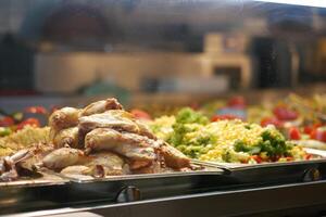 Delicious array of grilled chicken and fresh vegetables photo