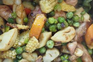 Delicious stir fried vegetables and chicken in a vibrant mix photo