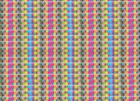 A repeating pattern with small flower or star-like shapes in a variety of bright colors. The pattern is tightly packed together to create a dense and colorful visual effect vector