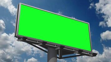 Empty billboard with chroma key green screen, on blue sky with clouds, advertisement concept video