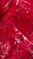 Red marble stop motion animation, Textured floor vertical background. Sketchbook concept, design, retro style, crumpled, worn, blank video