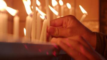 Lighting candles in a serene setting for reflection video