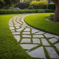 A beautiful stone walkway winds gracefully through a lush green field photo