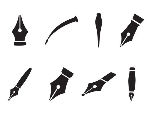 Diverse collection of black fountain pen nibs and pen tips on white background.