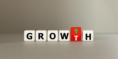 Blocks spelling GROWTH with a red block and green arrow. Symbolizes business increase, positive trends, and financial development. Ideal for success, growth, expansion, and upward progress now. photo
