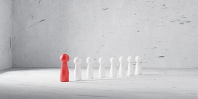 Red human figure standing in front of a line in a room minimalist with bare concrete walls, simple background, representing leadership, uniqueness, direction, and teamwork in a modern business concept photo