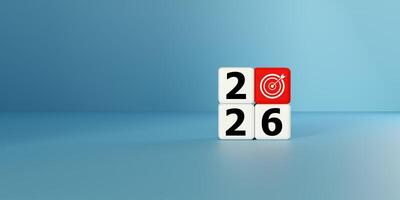 Blocks forming with a red target icon representing 2026. Symbolizes future goals, strategic planning, and targets. Ideal for business objectives, New Year resolutions, vision, achievement concepts now photo