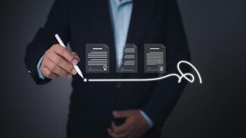 Businessman using a digital pen to sign electronic documents, symbolizing e-signatures, paperless contracts, and secure online agreements, legal technology, and streamlined document management. photo