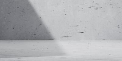 Minimalist concrete interior background with strong light and shadow contrast. Ideal for abstract, architectural, or modern design concepts in presentations and branding visuals. photo