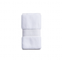 A neatly folded white cotton towel on a transparent background, ideal for use in spa or bathroom settings, representing cleanliness and comfort in everyday life. png