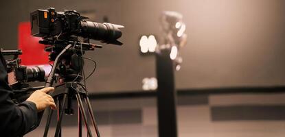 Professional cinema. cameras being used in a studio or event setting. photo