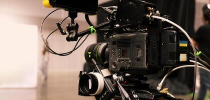 Professional cinema cameras being used in a studio or event setting photo