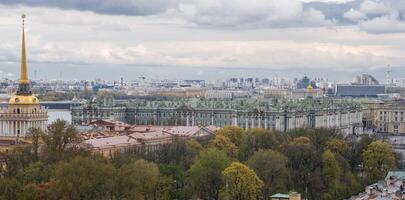 St. Petersburg Skyline View Highlighting Historical Architecture and Vibrant Fall Foliage photo
