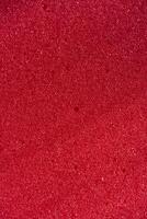 Base of breathable polymer foam. Red foam rubber. Packaging material. photo