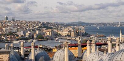 The vibrant city of Istanbul unfolds along the Bosphorus, with rooftops photo