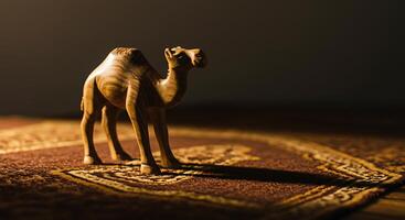 Wooden Camel Statue Standing on Carpet with Warm Lighting and Shadow photo