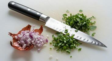 Chopped Vegetables with Sharp Knife on Cutting Board photo