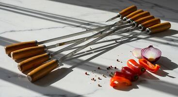 Skewers and Fresh Vegetables for Grilling Displayed on a Marble Surface photo