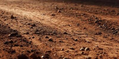 Rough Uneven Dirt Road with Rocks and Dust Surface photo