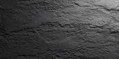 Close-up of Rough Black Stone Texture Background photo