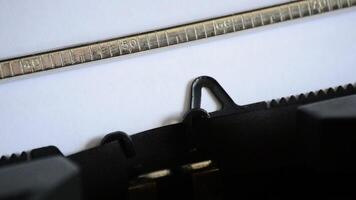 Typing the word REPORT with an old manual typewriter video
