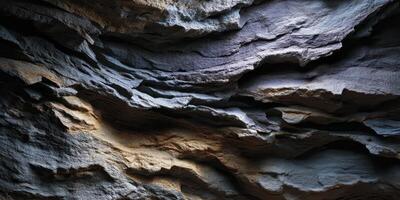 Natural Rock Formation Inside a Dark Cave Tunnel photo