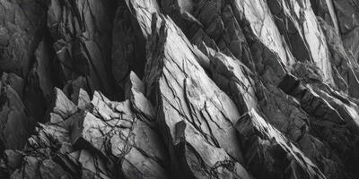 Close up texture of jagged sharp rocky cliff face photo