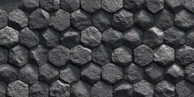 Hexagonal textured stone wall pattern in grayscale photo